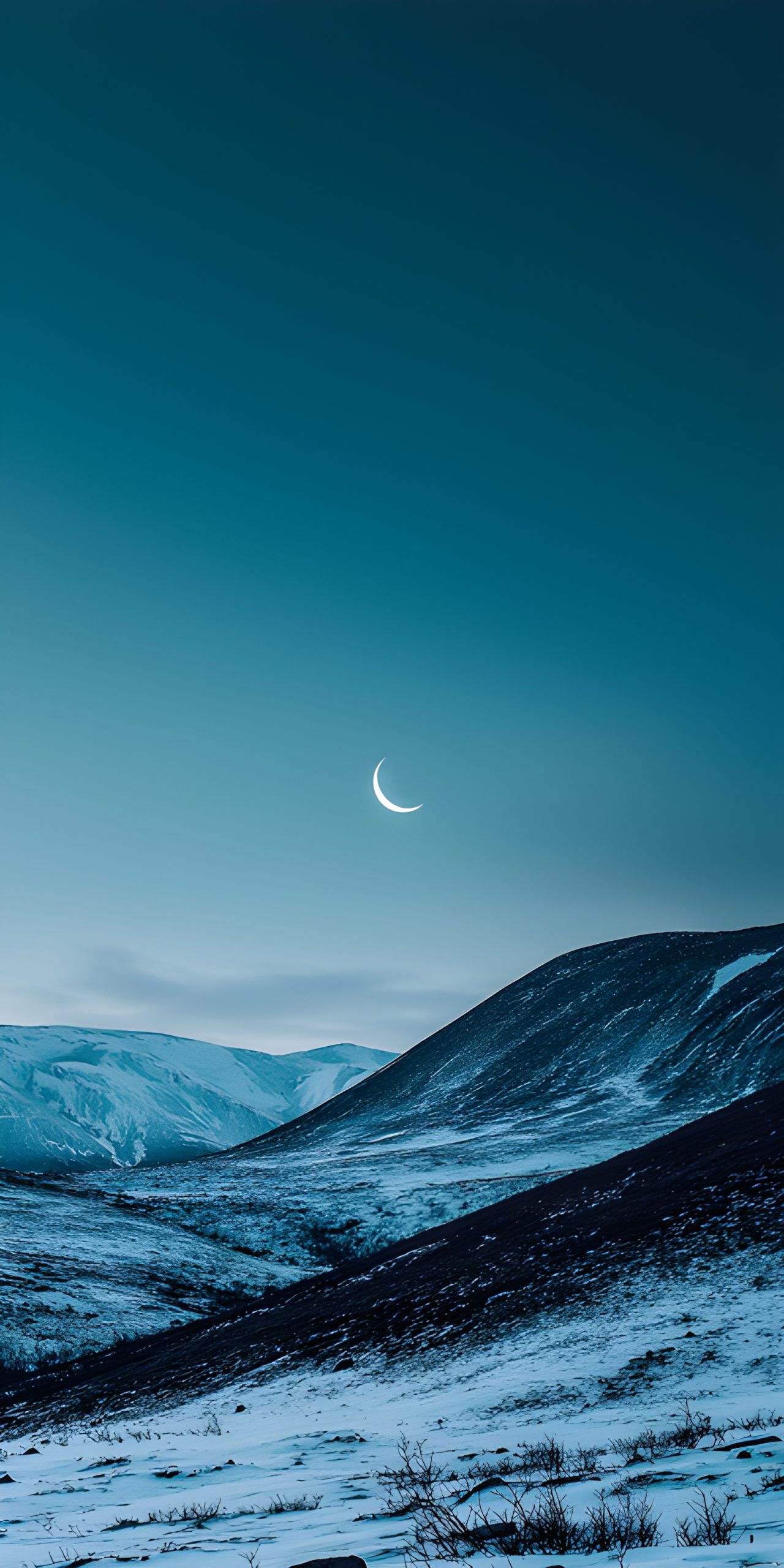 Crescent Moon Over Snowy Peaks